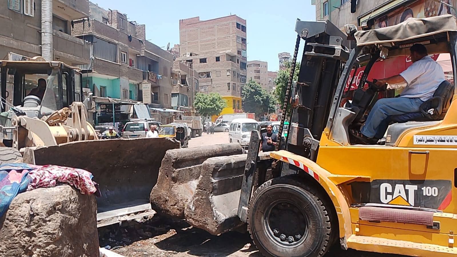 الجيزة تواصل حملاتها لتحرير الشوارع من الإشغالات وأعمال الفرز